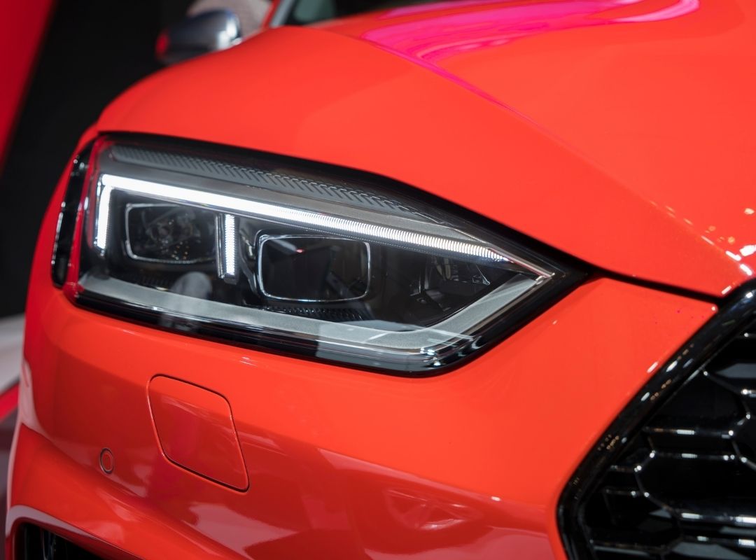 front lights of a red audi